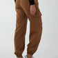 Camel coloured cargo pants with side pockets and removable chain detailing