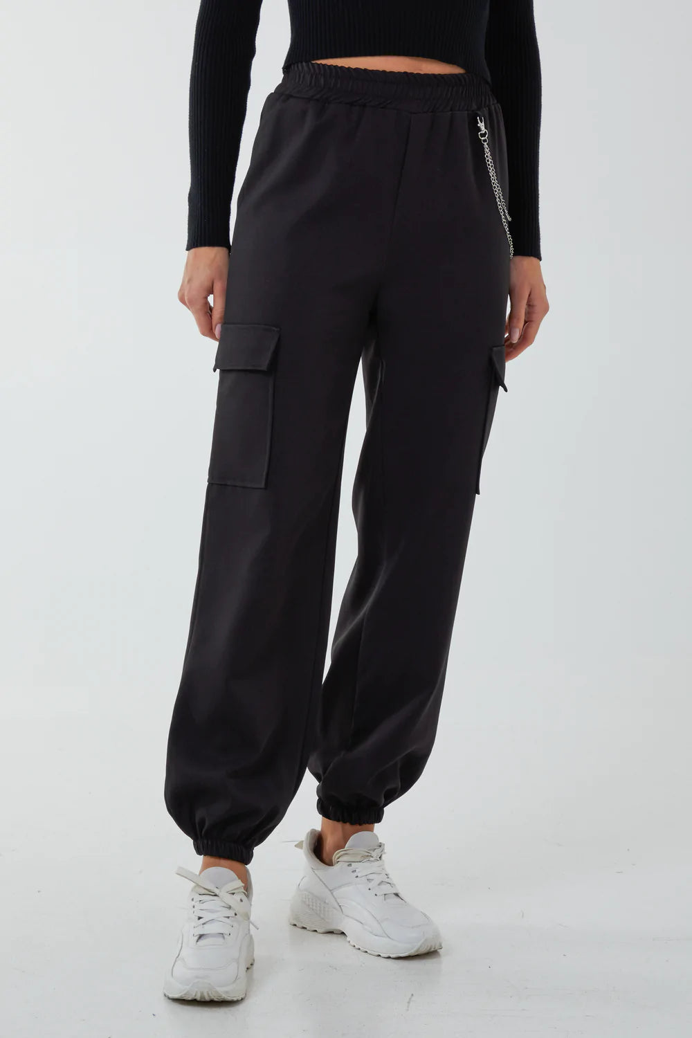 Black cargo pants with removable chain detailing and side pockets